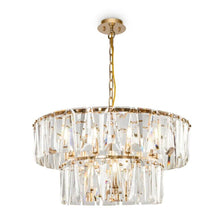 Puntes 12-light pendant light with sparkling crystal and elegant design.