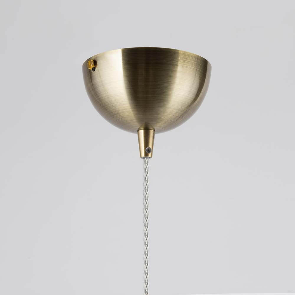 Tone Glas-Pendellampe mit Metallrahmen und Höhenverstellbarkeit, elegantes Design.