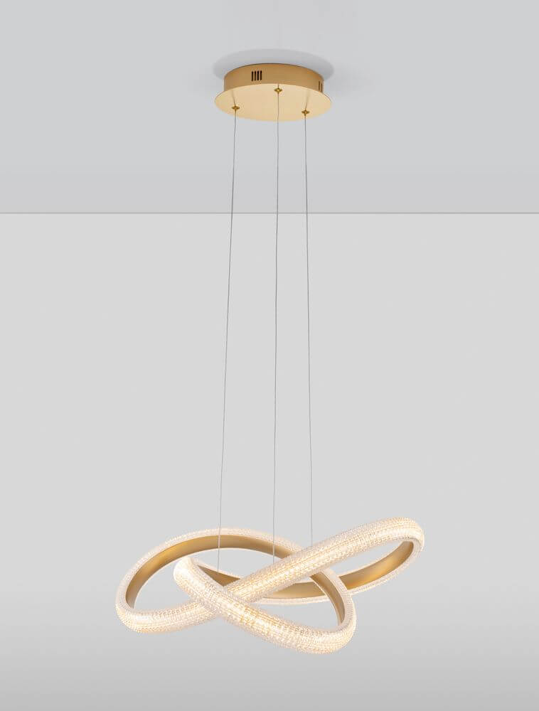 Medora LED Pendelleuchte Ø 52,5cm 3000K Messing-Gold in modernem Design über Tisch hängend.