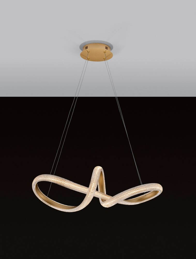 Medora LED Pendelleuchte Ø 75,5cm 3000K Messing-Gold in elegantem Design über dem Esstisch.