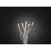 Micro LED Lichterkette mit 10 warmweißen Dioden, transparentes Kabel, leuchtend vor dunklem Hintergrund