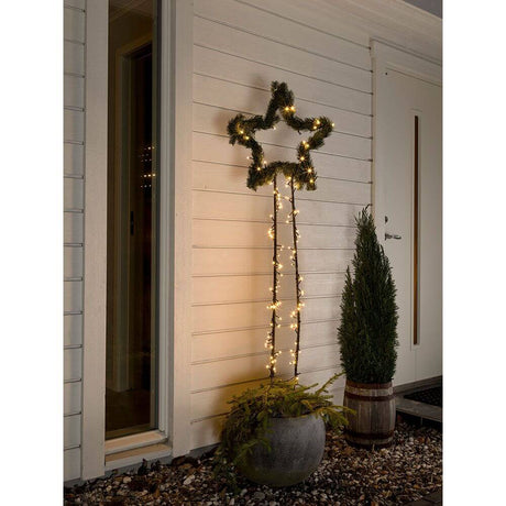 Dekorative Außenansicht einer gefrosteten 10,5m Micro LED Lichterkette gefrostet 40 Warmweiße Dioden IP44 im Stern-Design.