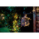 10,5m Micro LED Lichterkette gefrostet 40 Warmweiße Dioden IP44 an einer Lampe im Garten.