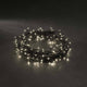 58m Micro LED Lichterkette mit 8 Funktionen 180 Warmweiße Dioden IP44 auf schwarzem Hintergrund.