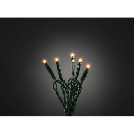 4m Micro LED Lichterkette 35 bernsteinfarbene Dioden mit leuchtenden Lichtern auf grünem Kabel