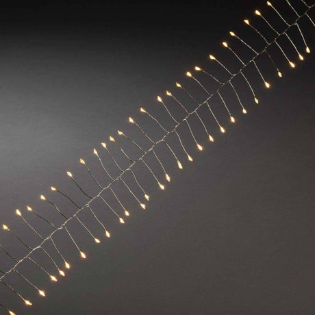 7m mikro LED Firecracker fairy lights 200 ravfarvede dioder på skinnende sølvtråd.