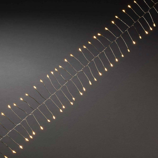 7m Micro LED Lichterkette Firecracker 200 bernsteinfarbene Dioden auf silberglänzendem Draht.