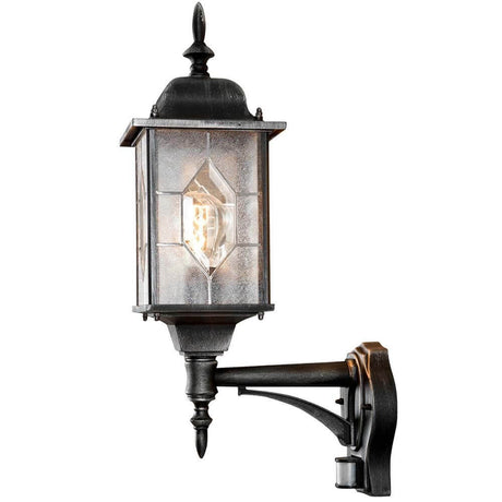 Lampada da parete esterna Milano con sensore nera, argento, aspetto cristallo di piombo con sensore a 140° e portata di 8m.