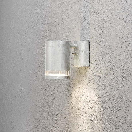 Modena reflector outdoor wall light steel, clear acrylic glass mounted on a wall.