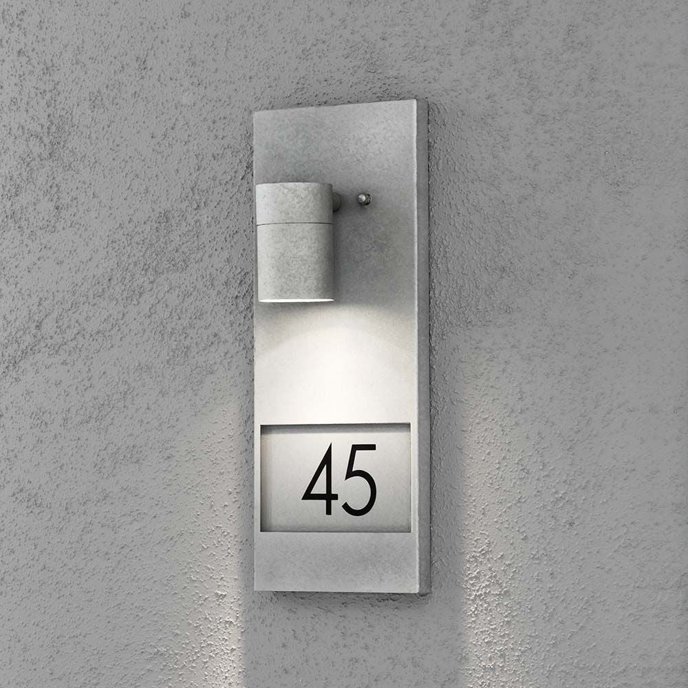 Lámpara de pared exterior Modena con números de casa galvanizados 