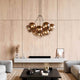 s.luce Modular Umbau bis 20 Leuchten in modernem Wohnzimmer mit eleganter Deckenlampe.