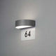 Monza LED Hausnummernleuchte inkl. Ziffern an grauer Wand, mit Ziffer 64, modernes Design, IP54, 2x4,5W.