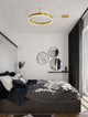 Motif LED Deckenleuchte Ø 60cm 3000K in einem modernen Schlafzimmer mit goldener Pendelleuchte.
