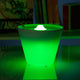 Rotaliana Multipot+ table lamp cable container + charging station white in green light