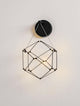 Nebula LED Wandleuchte Ø 23,4cm 3000K an einer Wand, modernes Design mit geometrischer Form.
