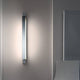 Nemo Ara 69 LED Wandleuchte verstellbar an einer Wand montiert, modernes Design, indirekte Beleuchtung, energiesparend.