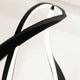 Detailansicht der Nemo In The Wind Stehlampe mit eleganten LED-Lichtern in geschwungenem Design.