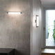 Nemo La Roche LED Wandlampe an einer stylischen Wand, die modernes Design und sanftes Licht kombiniert.
