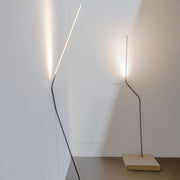 Nemo Neo LED leaning floor lamp, modern design made of curved steel and aluminium with indirect lighting.