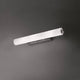 Nemo Norma 65 LED Wandleuchte mit opalweißem Diffusor und polierter Aluminiumstruktur.