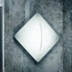 Nemo Saori Q2 Wand- & Deckenleuchte 100x100cm an einer Wand in modernem Design.