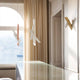 Nemo Tubes Large LED Wandlampe einstellbar in modernem Innenraum mit eleganter Beleuchtung.