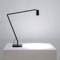 Nemo Untitled LED Tischlampe mit flexibler Armstruktur und zylindrischem Spot, matt schwarz lackiert.