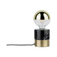 Neordic Vala Tischleuchte max1x20W E27 Messing geb Schwarz Marmor auf Tisch mit stylischem Design.