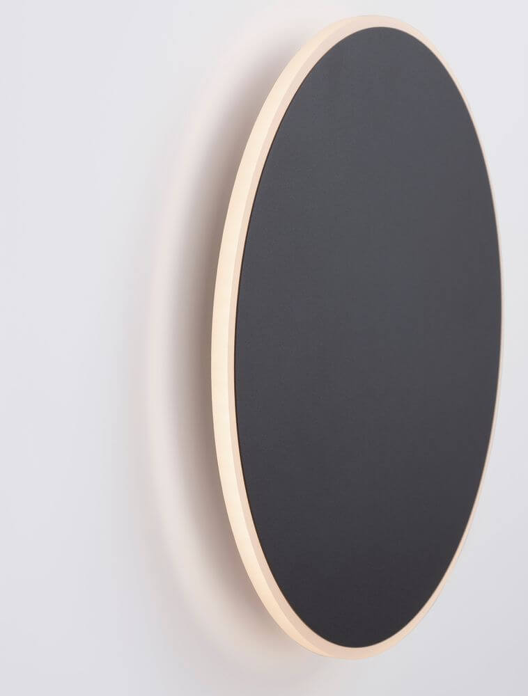 Nevo LED Wandleuchte Ø 30cm 3000K mit schwarzem LED-Licht und elegantem Goldrahmen an einer Wand.