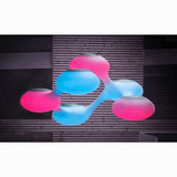 Moderne Cosmo XXL LED Pendelleuchte in Pink und Blau, dimmbar und pendelbar, aus hochwertigem Kunststoff.