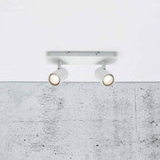 2-light Frida White spotlight with swivel spotlights and a matte white design mounted on a ceiling.