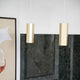 Alanis Pendelleuchte in goldener Ausführung, minimalistische Designpendelleuchten, modernes Wohnambiente.