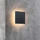 LED Wandaussenleuchte Artego IP54 Schwarz an betonierter Wand mit sanfter Beleuchtung