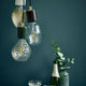Marmorpendellampe Siv i svart, stilfull designlampe med kontrastfull marmoroverflate og dekorativ lyskilde.