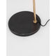 Nova Luce Alvarez floor lamp with round black marble base and golden metal stem, detailed view of the base