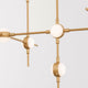 Atomo LED Hängeleuchte 106cm Gold mit dekorativen, runden LED-Lampen und elegantem Design aus Gold und Acryl.