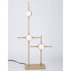 Atomo LED Tischleuchte in modernem Design mit goldfarbenem Metall und runden Lampenschirmen.