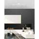 Base Deckenstrahler 4-flammig Metall im modernen Wohnzimmer mit elegantem Design und drehbaren Strahlern.