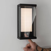Bay wall solar light with motion sensor on the wall with warm white light and motion sensor activated.