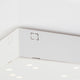 Nahaufnahme der Cielo LED-Sternenhimmel Deckenlampe mit weißem, modernen Design.
