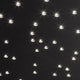 Cielo LED-Sternenhimmel Deckenlampe mit leuchtenden Sternen auf schwarzem Hintergrund.