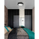 Darius Deckenlampe Metall in modernem Schlafzimmer mit schwarzem Design und eleganten Akzenten.