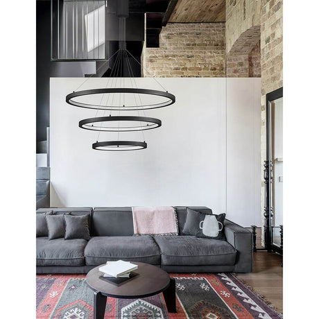 Empati LED Hængelampe 3 ringe over en moderne stue med minimalistisk design.