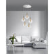 Filo Hängelampe 5-flammig Glas Aufhängung mit eleganten Glaslampenschirmen und modernem Design im Wohnzimmer.