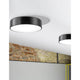 Finezza Deckenleuchte Stahl an der Decke mit modernem Design und neutralem Licht in einem stilvollen Raum.
