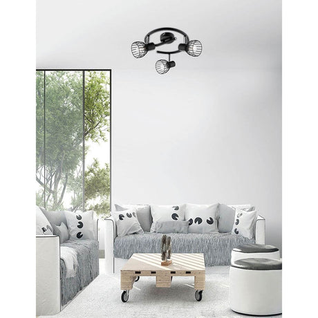 Fiumicino Deckenspot 3-flammig Schwarz in modernem Wohnzimmer mit eleganter Beleuchtung.