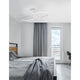 Fungo LED Deckenlampe Weiß im Schlafzimmer mit modernem Design und eleganter Lichtstreuung.