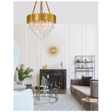 Eleganter Grane Kronleuchter 12-flammig in Gold mit Kristall-Prismen im modernen Wohnzimmer