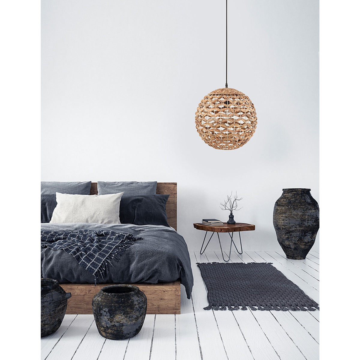 Nova Luce Griffin pendant lamp Ø 40cm made of dried water hyacinth, natural colour, hanging above the bed