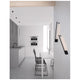 Moderne Gropius LED Wandleuchte in einer minimalistischen Küche mit Stühlen und Tisch.